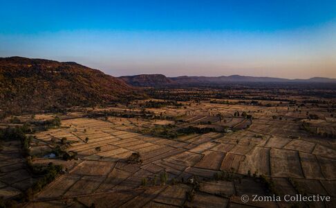Looking towards the Phu Phan mountains over the rice fields, Sakhon Nakhon Province, Thailand, December 2025