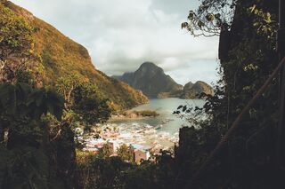 Wiew of El Nido's lush mountains and serene waters in the Philippines.