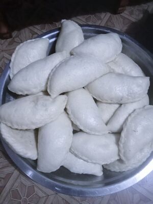 Siddu, the steamed bread of Kullu, served with ghee as it is made today. The photo does not show cannabis.